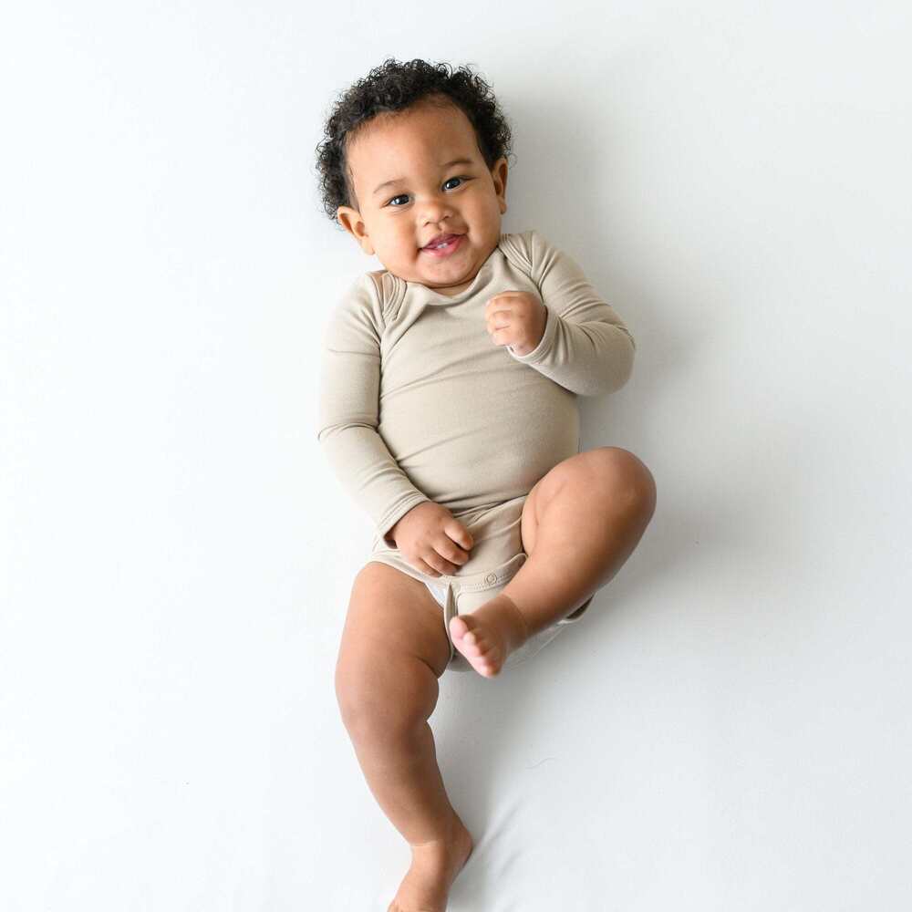 Kyte Baby Long Sleeve Bodysuit in Almond Size 0-3 monthsAlmond / 0-3 months